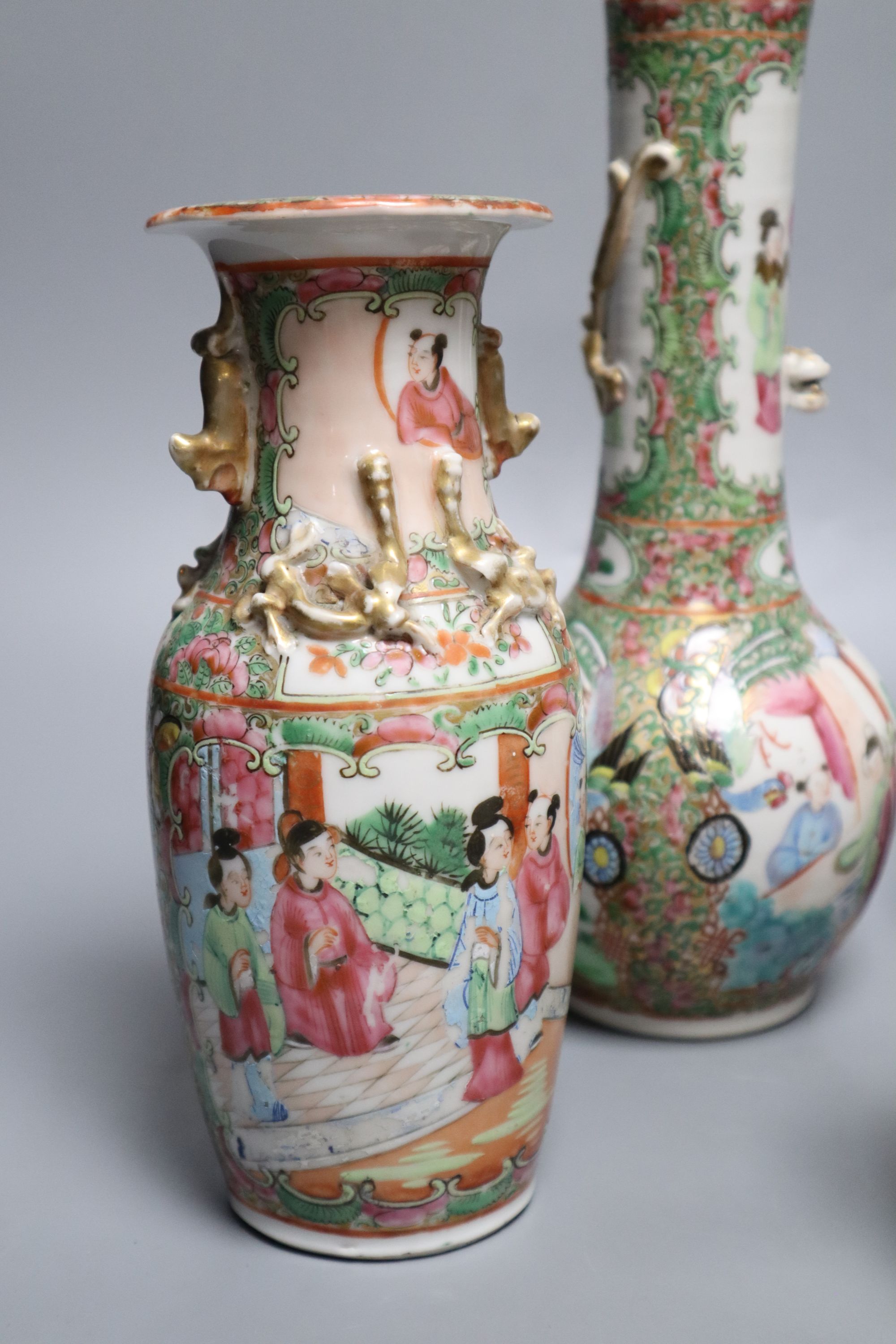 A pair of Chinese famille rose bottle vases, a similar teapot, vase and jar, 19th century, tallest 25cm